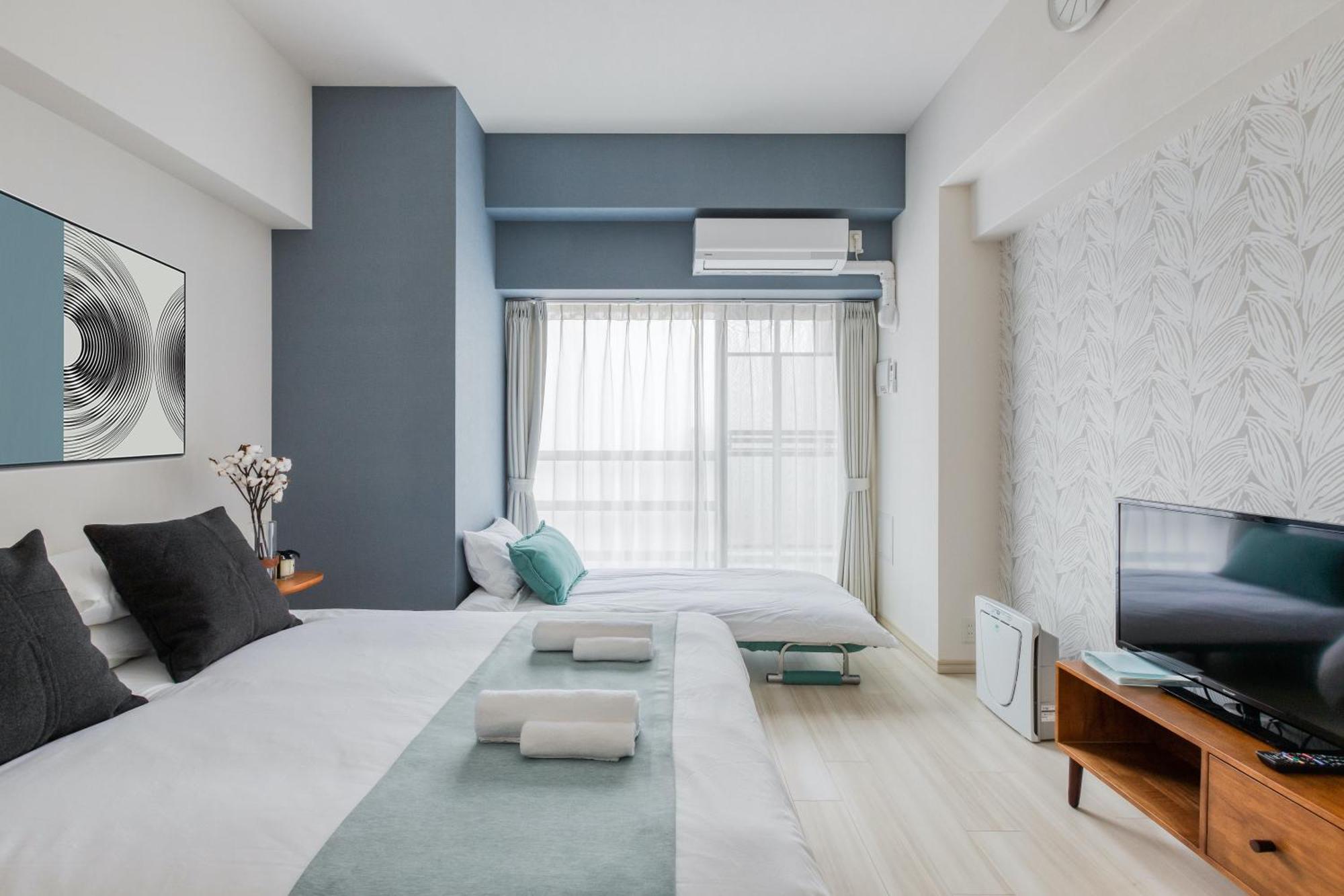 Ostay Shin-Osaka Hotel Apartment Rum bild